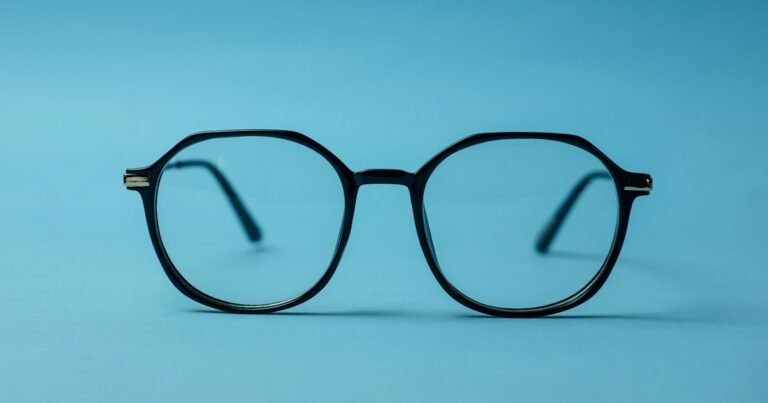 Black-framed glasses on a blue background