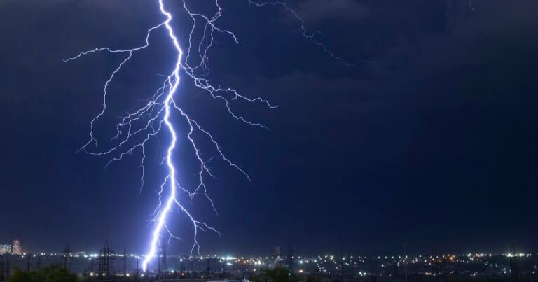 Lightning in a stormy sky above a city